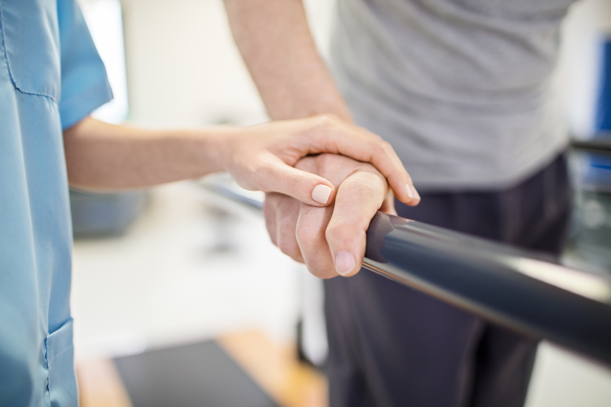 Carer helping someone in care home