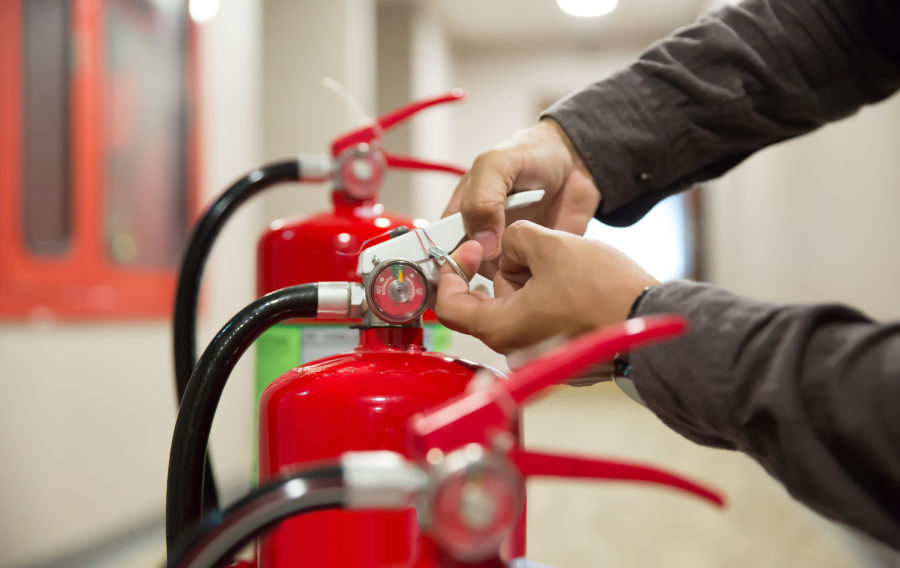 Churches Fire engineers checking extinguishers