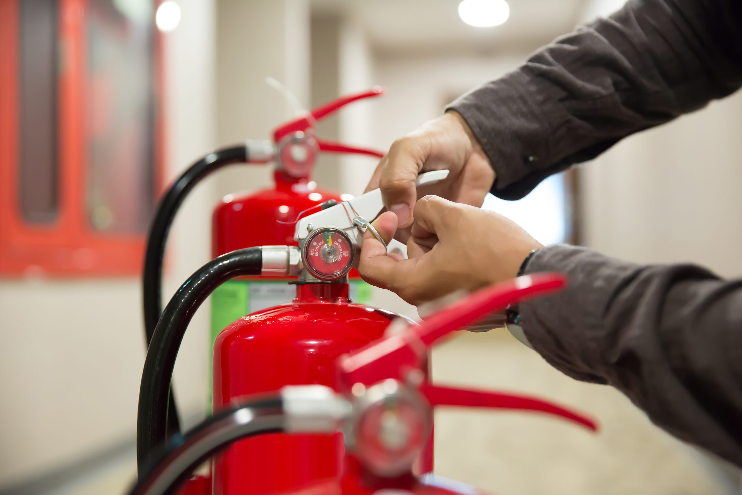 Churches Fire engineers checking extinguishers