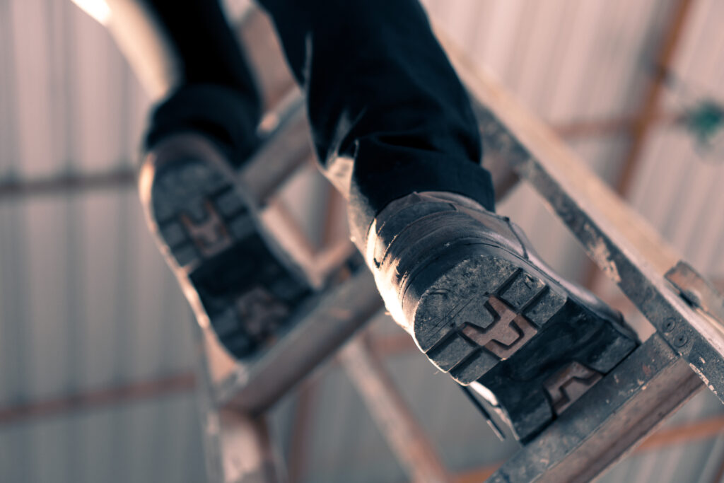 Engineering Engineers Are Climbing Stairs In The Construction Site.